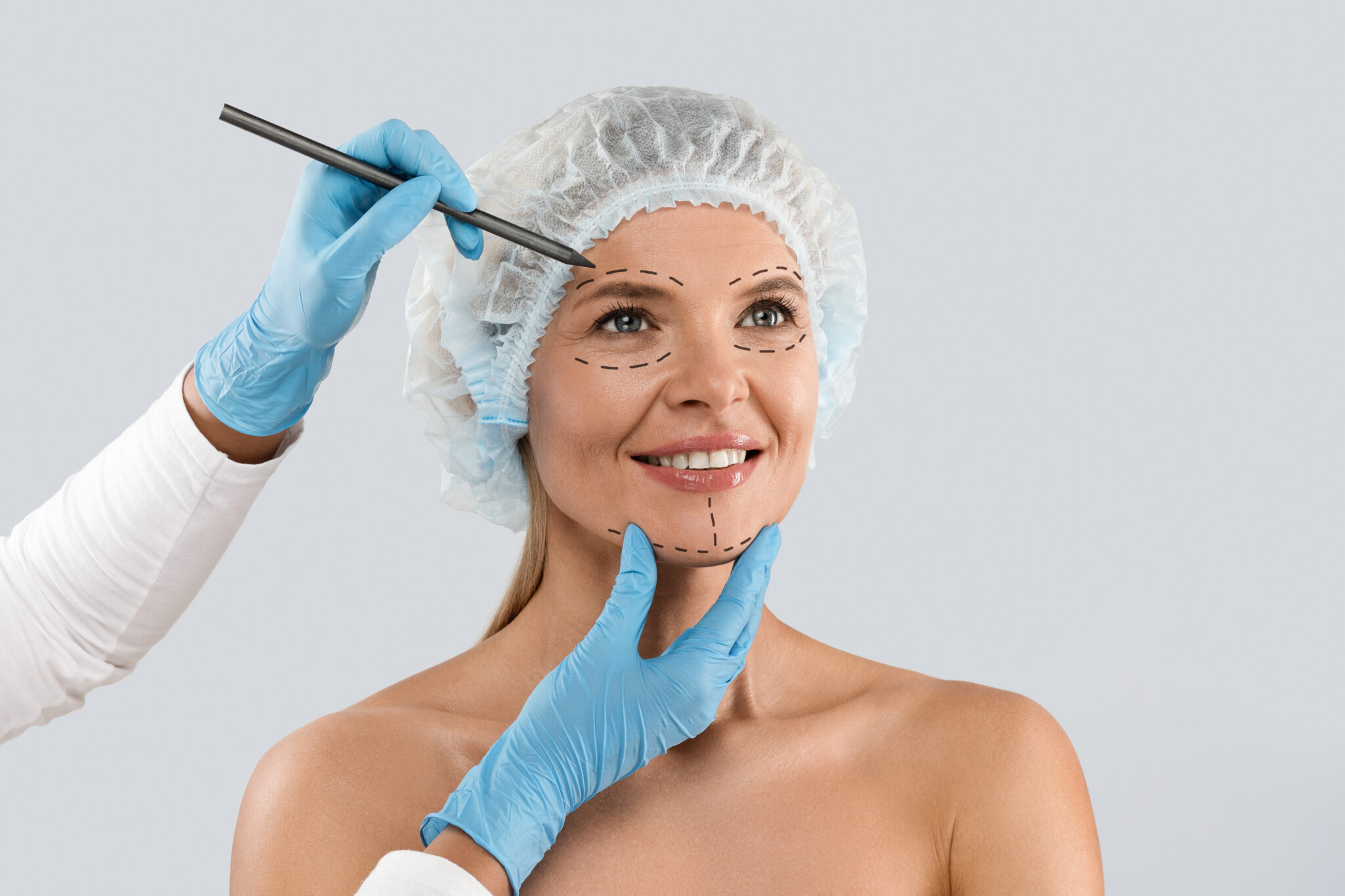 Portrait of middle aged beautiful female wearing medical cap
